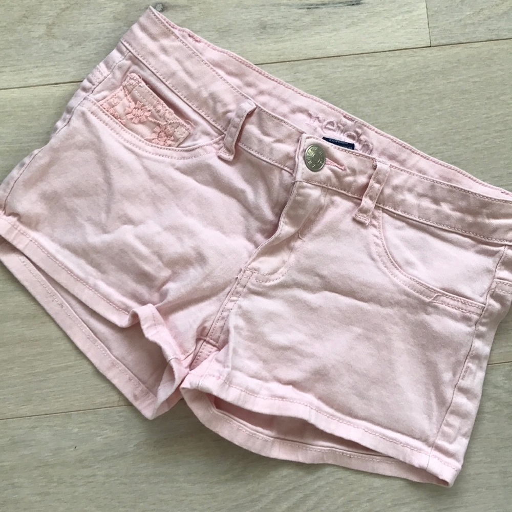 Light pinky peachy colored shorts